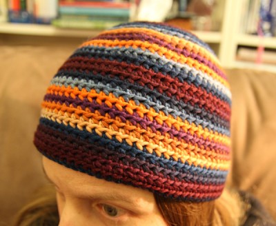 Reverse side of the striped adult woman crochet beanie