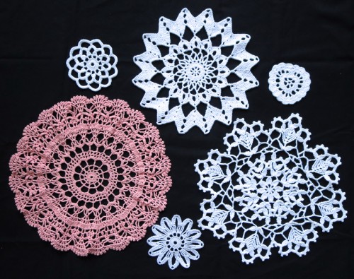 Six crochet doilies