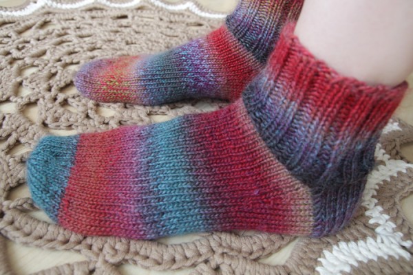 Knitted socks being worn