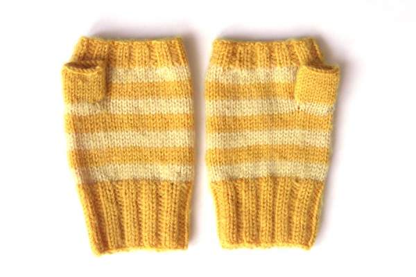 A pair of hand knit mittens after felting attempt